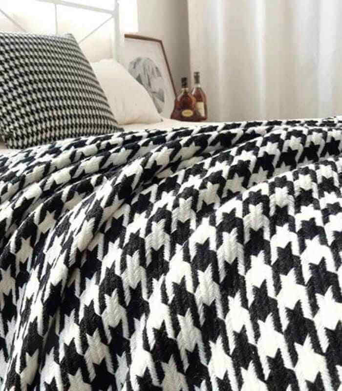 **Étoile Noir Wurfdecke – Zeitlose Eleganz für Ihr Zuhause** 1